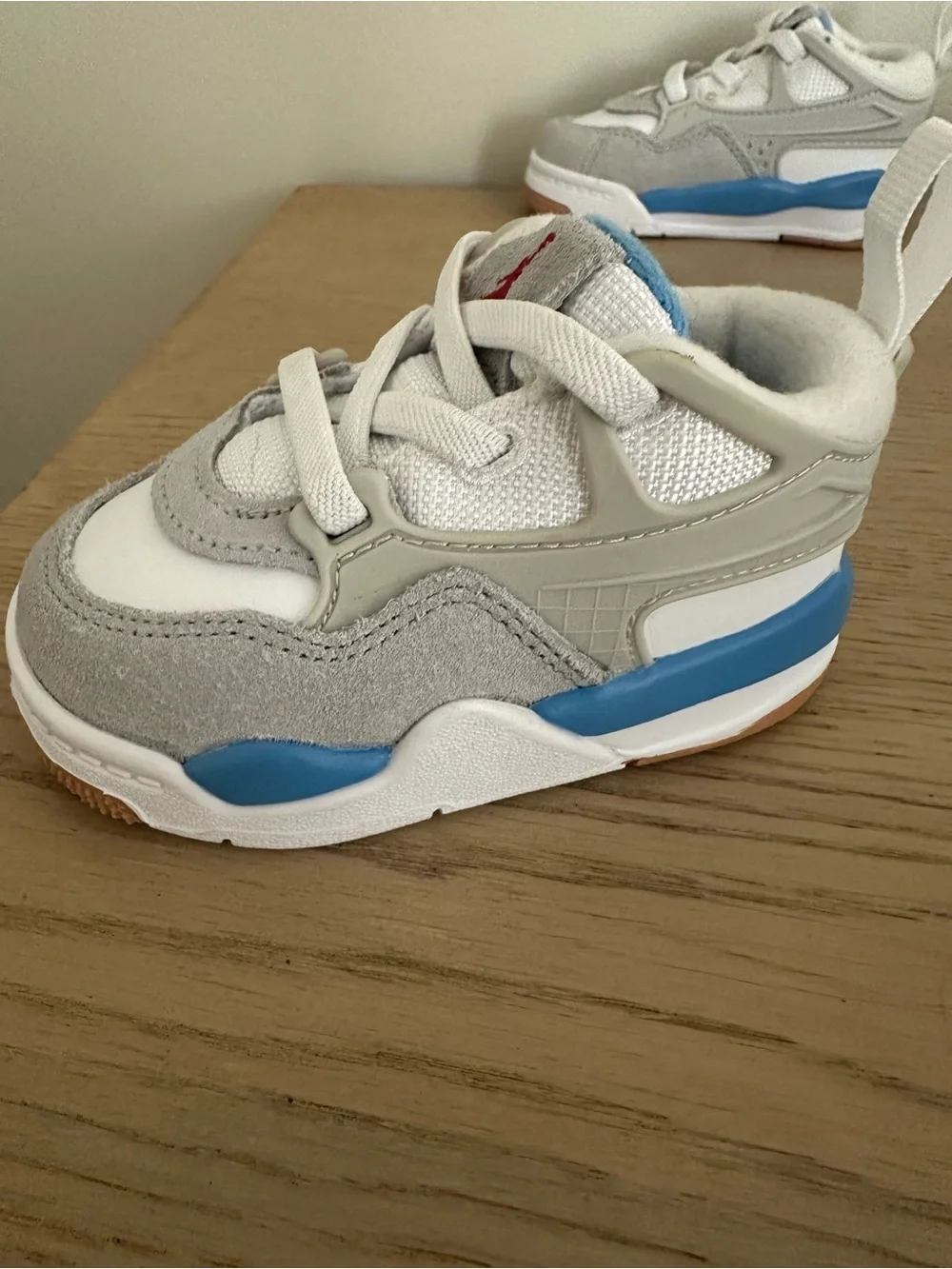 Jordan Kids White, Gray and Blue Sneakers with Red Logo